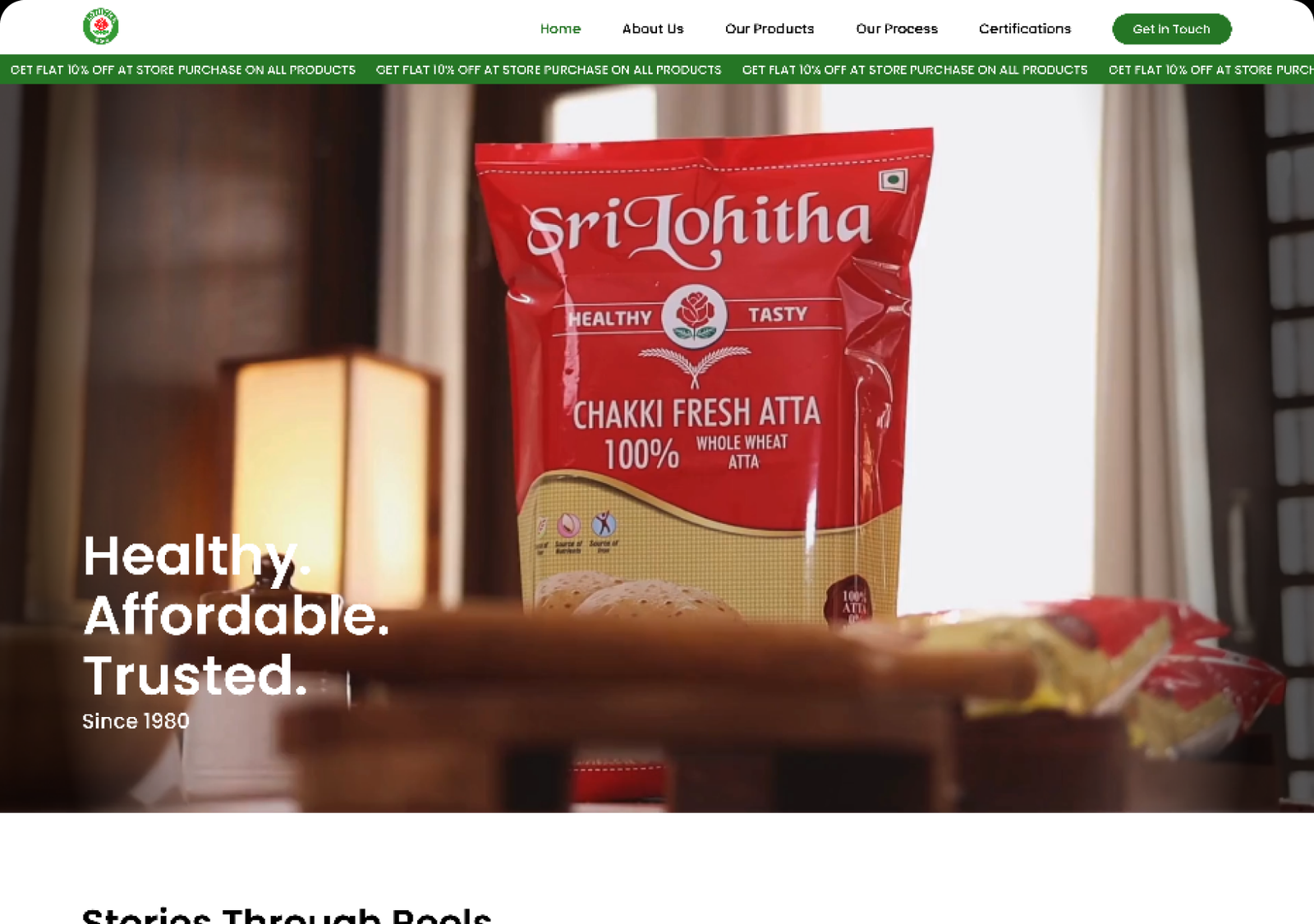 Lohitha Foods website on a laptop